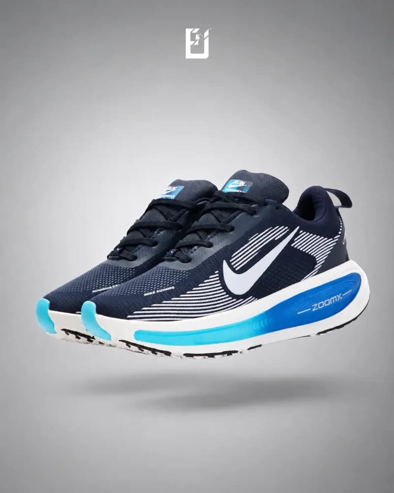 Nike Vomero 18 - Negro/Azul